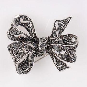 Brosa metalica fundita cu pietre