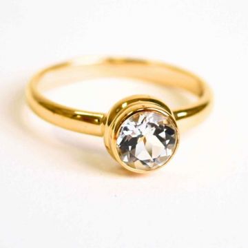 Inel argint 925 placat aur 18K cu Topaz Alb rotund fatetat ,   Claritate si Armonie