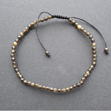 Bratara fatetata obsidian auriu 3 mm snur reglabil