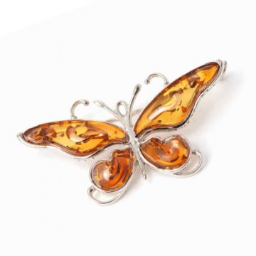 Brosa fluture chihlimbar rosu si argint 925 ,   detaliu rafinat pentru o prezenta calma